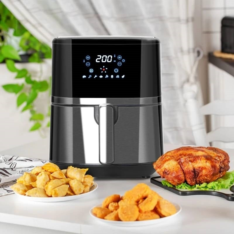 Introducing the Silver/Black Multi-Function 4 in 1 Oven Air Fryer 4.7 QT - Crispy & Healthy Cooking Made Easy